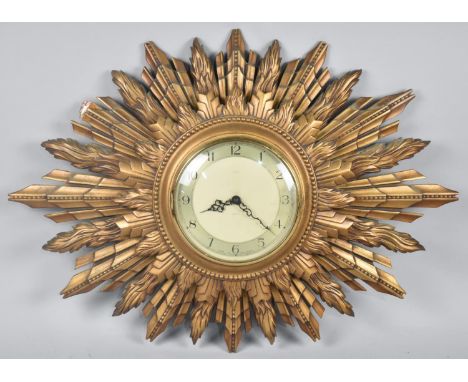 A Vintage Smiths Gilt Starburst Wall Clock, 66x49cms 