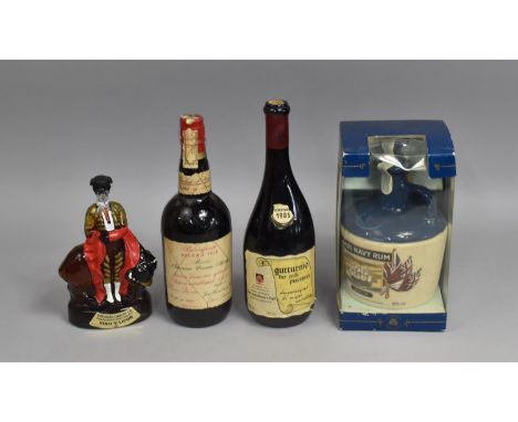 A Commemorative Ceramic Decanter, Lambs Navy Rum HMS Victory together with a Spanish Liqueur 1985 Italian Wine and Beresford 