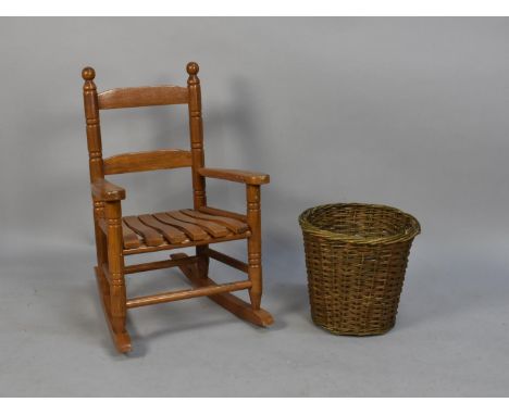 A Mid/Late 20th Century Children's Ladder Back Rocking Chair together with a Wicker Waste Bin 