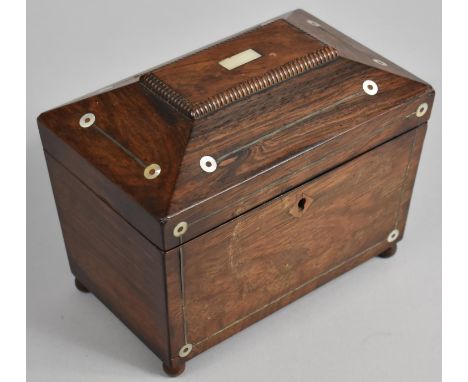 A 19th Century Rosewood Two Division Tea Caddy of Sarcophagus Form with Mother of Pearl Disc and String Inlay, on Bun Feet, 1