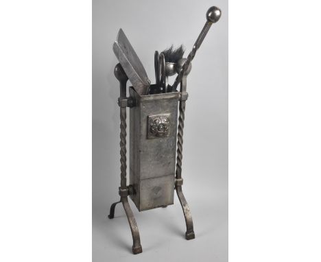 A Matching Oxidized Metal Fire Companion Set with Barley Twist Supports and Range of Tools 