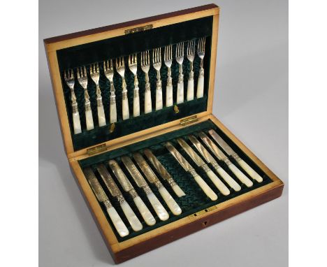 An Edwardian Mahogany Canteen Containing 12 Mother of Pearl Handled Fruit Knives and Forks, One Knife Handle AF 