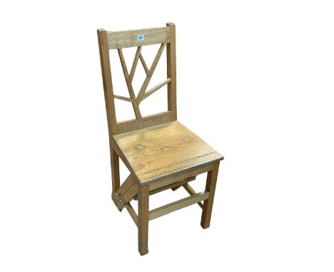 Bespoke light oak metamorphic library chair.