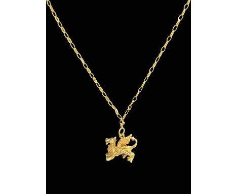 9 carat gold dragon pendant with 9 carat gold link neck chain.