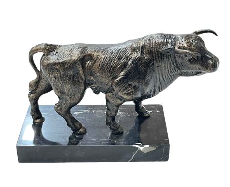 Bronzed model of a bull on marble plinth, 19cm high.