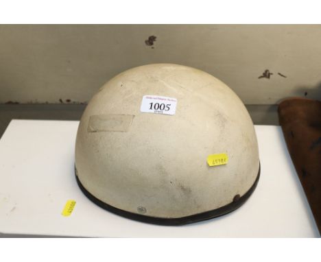 A vintage motorcycle helmet sold as collectors item