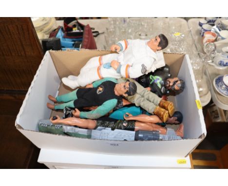 A box of Action Man figures 