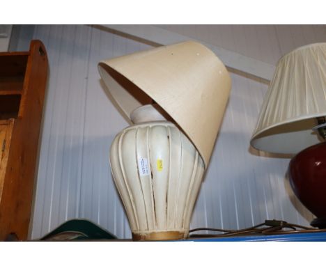 A table lamp and shade 