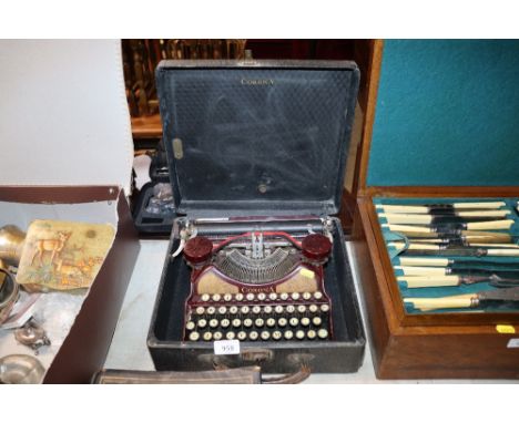 A Corona typewriter in fitted case 