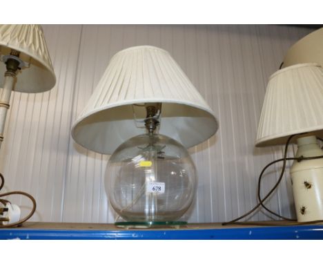 A glass table lamp and shade 