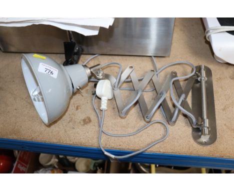 A wall mounting Anglepoise style lamp