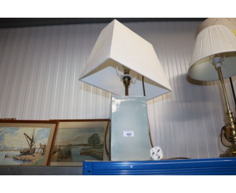 A table lamp and shade