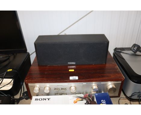 A Luxman stereo amplifier; and a Merak speaker
