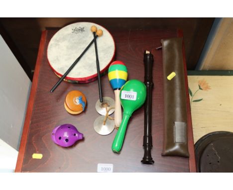 A collection of musical instruments to include recorder