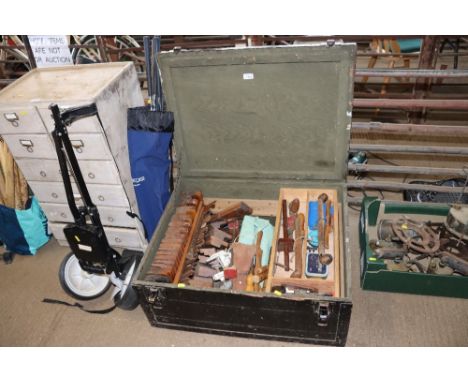 A large carpenter's tool chest and contents of various moulding planes and other tools