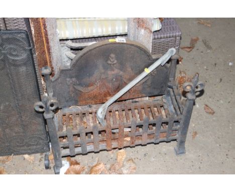 A galvanised anchor together with a cast iron fire grate