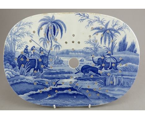 An early nineteenth century blue and white transfer-printed Spode Indian Sporting series drainer, c.1810. It is marked to the