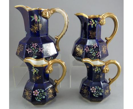 A set of early nineteenth century Spode hydra jugs, c.1820. Each is decorated on a blue ground with gilded and enamel flowers