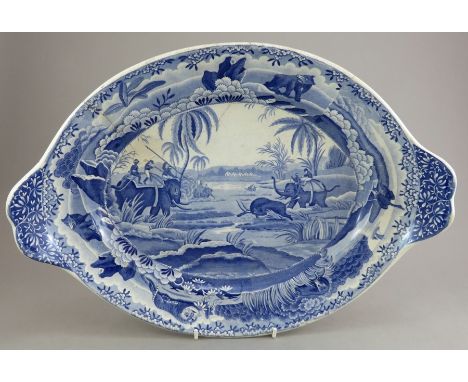 An early nineteenth century blue and white transfer-printed Spode Indian Sporting series soup tureen stand, c.1810. It is mar