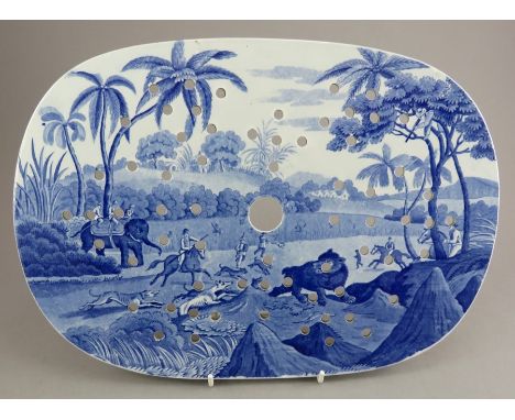 An early nineteenth century blue and white transfer-printed Spode Indian Sporting series drainer, c.1810. It is marked to the