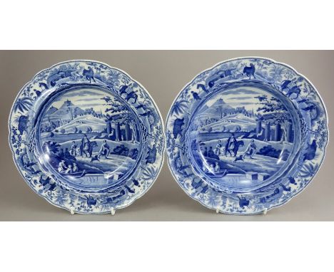 A pair of early nineteenth century blue and white transfer-printed Spode Caramanian series soup dishes, c.1810. They are mark