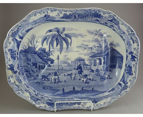 An early nineteenth century blue and white transfer-printed Spode Indian Sporting series well and tree platter, c.1810. It is