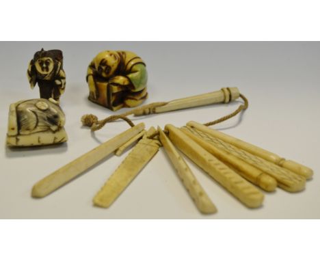 A 19th Century bone teething set; a Japanese ivory netsuke; etc