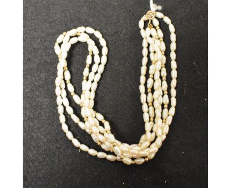 A fresh water pearl and yellow metal bead three strand necklace, 9k clasp
