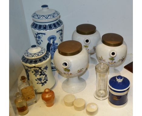 Three 20th century ceramic apothecary / syrup storage bottles, elongated spout, metal caps, RHEI ; ZINGIBERI; CERAS:NIGR: a 2