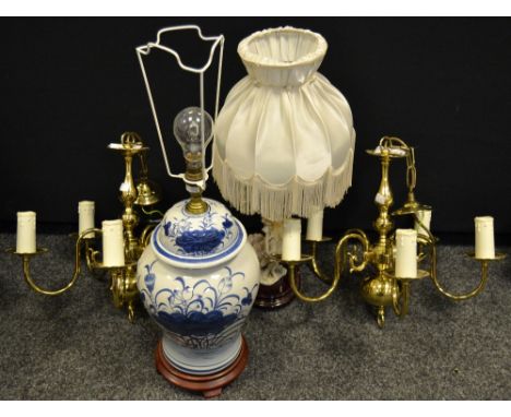 Lighting - a 20th century brass standard lamp with shade; a pair of brass five branch chandeliers; a 20th century delft table