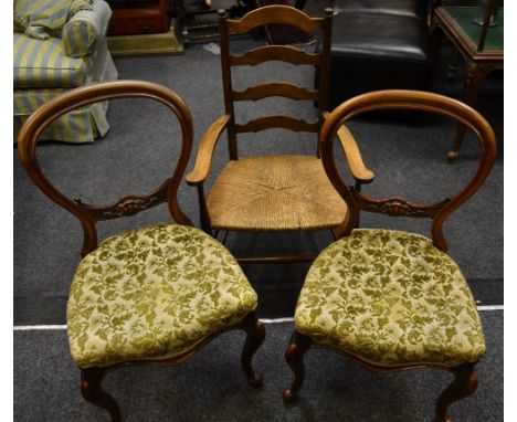 A pair of Victorian mahogany balloon back chairs carved horizontal splat, serpentine stuffed over seat, cabriole forelegs, kn