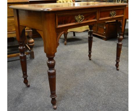 A Victorian mahogany hall table, moulded top, two short drawers to frieze turned legs, ceramic casters 76cm high x 108cm wide