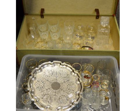 A 1962 military suitcase bearing broad arrow mark; six lead glass whisky tumblers; coloured glass liqueur glass; a shot glass