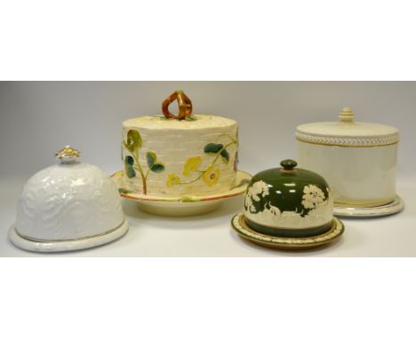 A Copeland Spode cheese dome on stand, in the green, applied in relief with a fox hunting scene; A 19th century creamware cyl