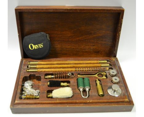 A cased gun cleaning kit
