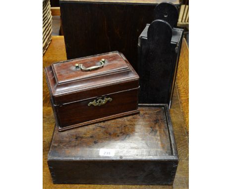 An oak candle box circa 1800; another early 19th Century oak box with sliding cover; a George III tea caddy (3)