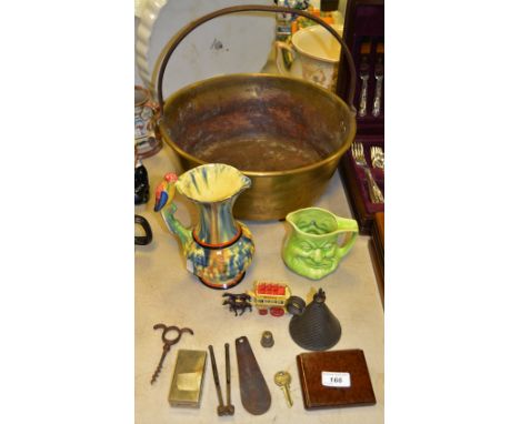 A brass jam pan;  a corkscrew;  nutcrackers;  faux walnut case;  character jug;  etc 