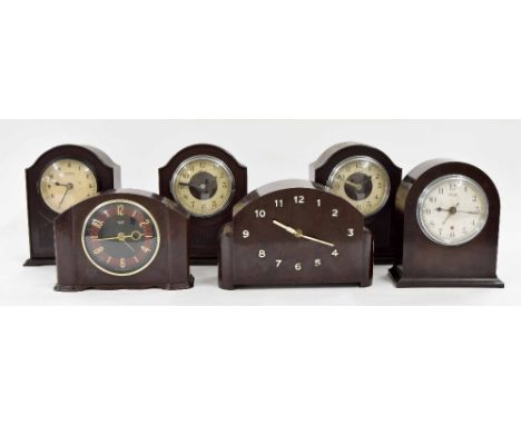 Three small Bulle electric mantel clocks in Bakelite cases; also three other Bakelite cased electric mantel clocks, tallest 7