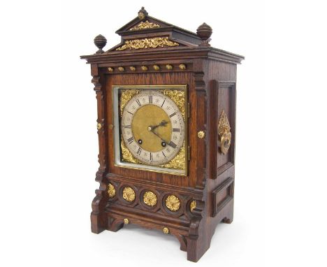 Lenzkirch oak ting-tang mantel clock, the 6.5" square dial with silvered chapter ring enclosing a matted centre, within an ar