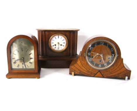 French oak two train mantel clock striking on a bell, 9.5" high; also an Art Deco walnut cased three train mantel clock and a