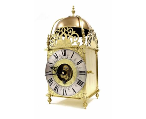 Good brass Eureka electric lantern clock, the 7.25" silvered chapter ring enclosing an inner ring inscribed Eureka Clock Co L