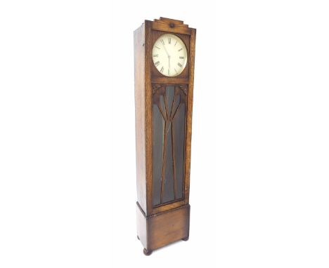 Art Deco style oak three train longcase clock, the 10.5" cream dial within a glazed carved case, 73" high (pendulum and three