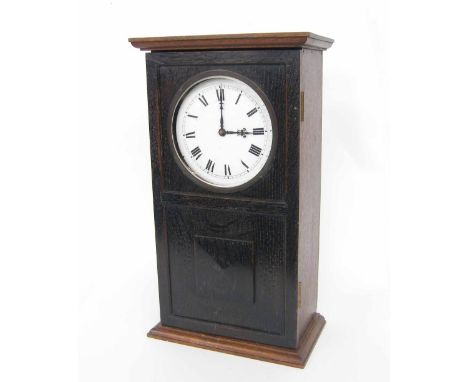 Reason MFG electric mantel clock, the 5.75" white dial within an oak stepped panelled case, 18" high