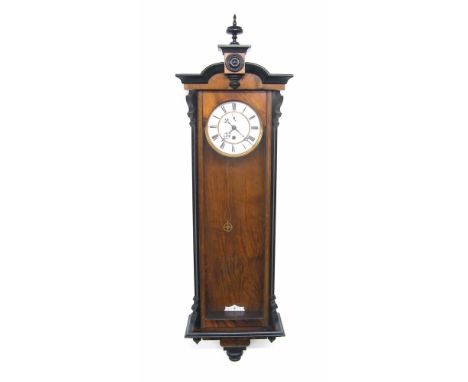 Walnut single weight Vienna regulator wall clock, the 6.25" white dial with subsidiary seconds dial, within a glazed and cant