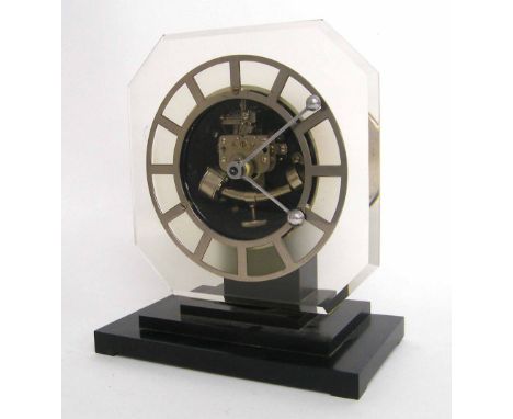 Ato electric mantel clock, the 5.25" silvered Perspex chapter ring within an octagonal surround and supported upon a stepped 