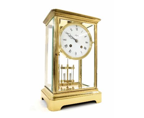 Angelus brass four glass two train mantel clock, the 4" white dial over a mercury pendulum and within a bevelled glazed stepp