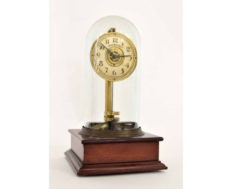 'Rebesi' electric mantel clock, the 3.5" silvered dial under a glass dome and upon a stepped mahogany base, 11.75" high