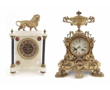 French gilt metal and onyx mantel clock, the 3.5" onyx dial signed Montiel, Toulouse, within an ornate case surmounted by a c