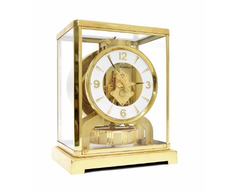 Jaeger LeCoultre Atmos clock, the 4.25" white chapter ring enclosing a skeletonised centre, no. 340178, within a brass bound 