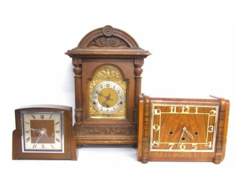 Large carved oak three train mantel clock, 18.5" high; also an Art Deco walnut three train mantel clock and another in an oak